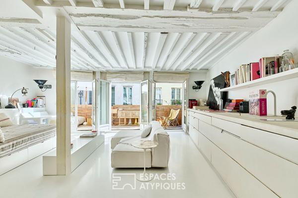 Appartement rénové avec terrasse au coeur du quartier des enfants rouges