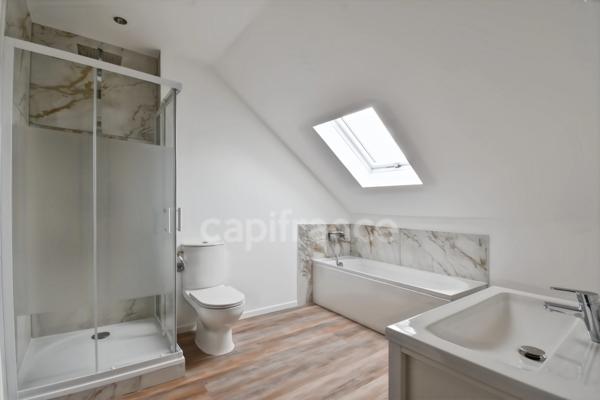 À vendre à Sainte-Geneviève-des-Bois (91), Belle maison familiale de 123 m², 5 chambres, véranda, garage, sans travaux et parfaitement situé.