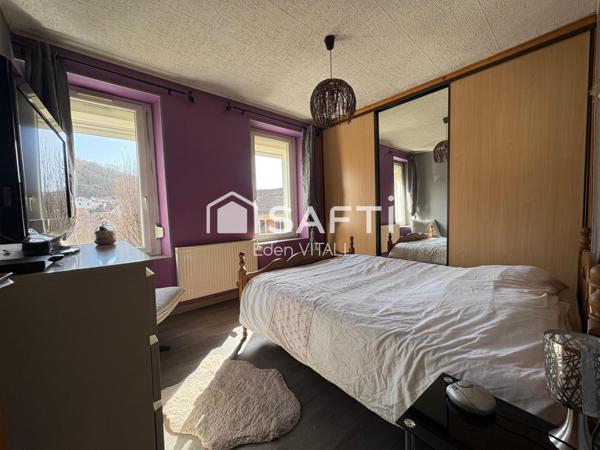 Maison mitoyenne de 61 m2, 2 chambres, courette extérieur.