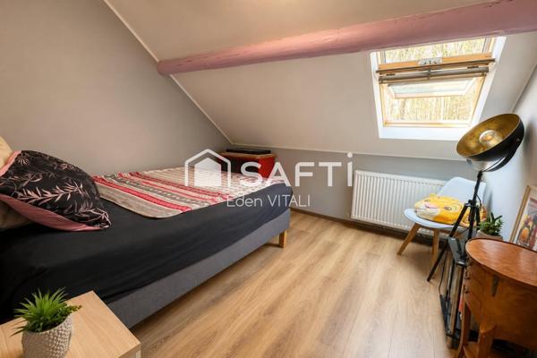 Maison mitoyenne de 61 m2, 2 chambres, courette extérieur.