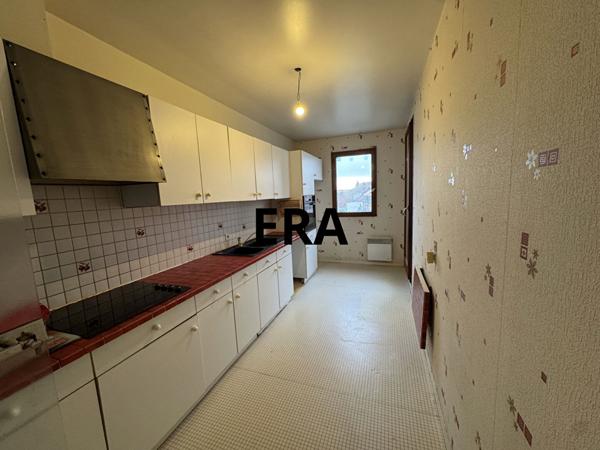 Appartement de 81m2, 2 chambres avec balcon + place de stationnement