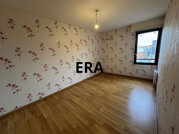 Appartement de 81m2, 2 chambres avec balcon + place de stationnement