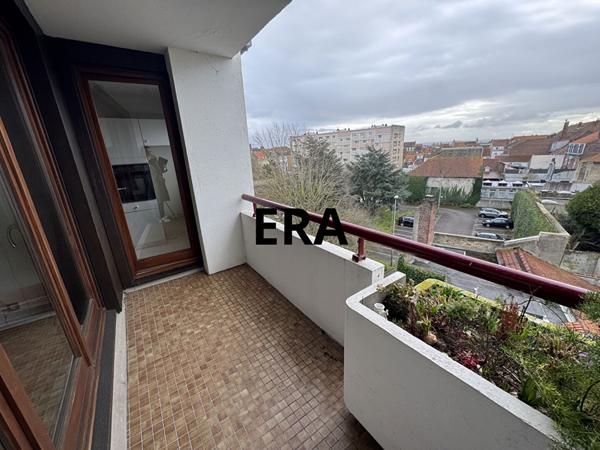 Appartement de 81m2, 2 chambres avec balcon + place de stationnement
