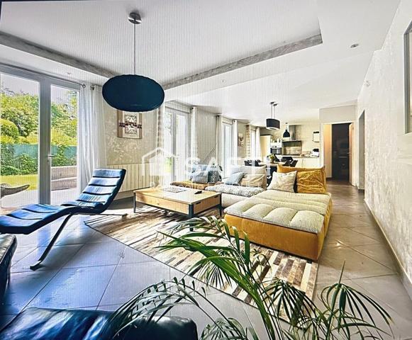 Maison familiale dans un cadre verdoyant prisé