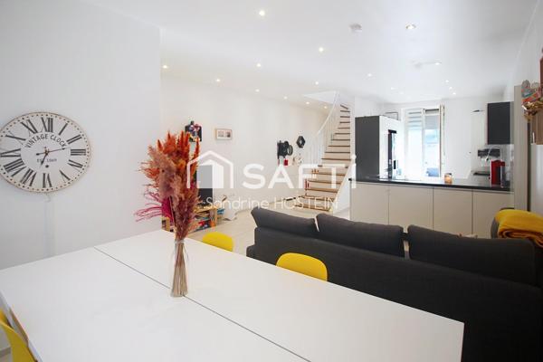 Maison de 120m2 hab avec 4 chambres, 2 terrasses et jardin.