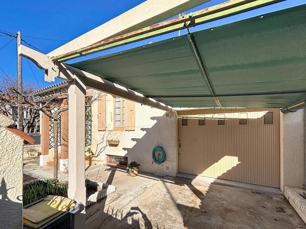 Maison impeccable avec sous-sol, garage et véranda