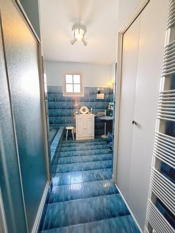 Maison impeccable avec sous-sol, garage et véranda