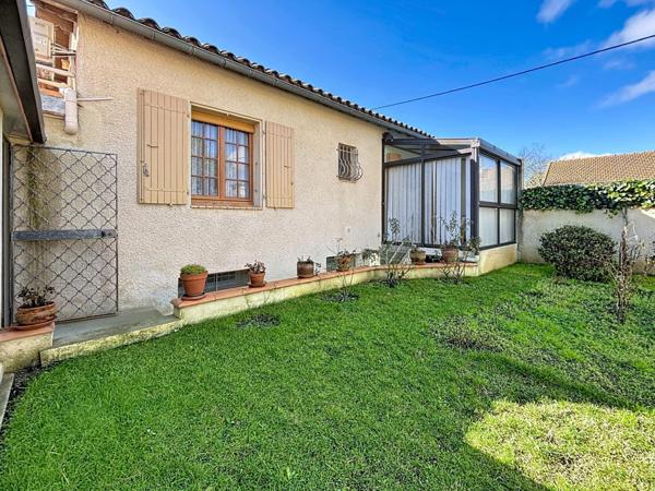 Maison impeccable avec sous-sol, garage et véranda