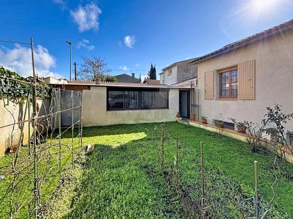 Maison impeccable avec sous-sol, garage et véranda