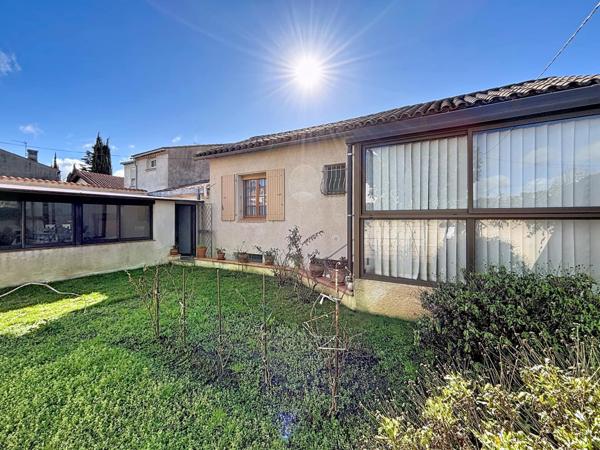 Maison impeccable avec sous-sol, garage et véranda