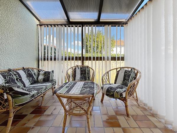 Maison impeccable avec sous-sol, garage et véranda