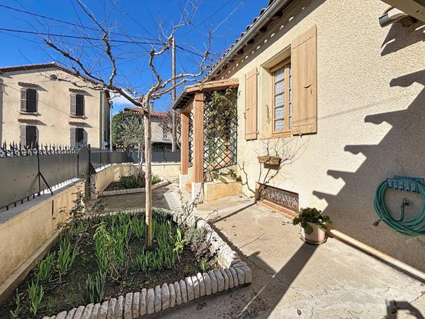 Maison impeccable avec sous-sol, garage et véranda