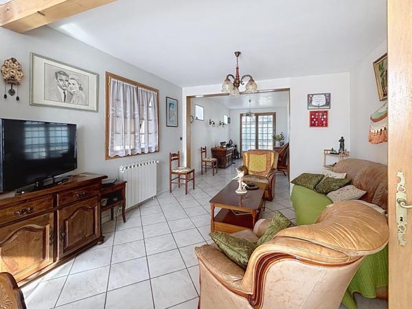 Maison impeccable avec sous-sol, garage et véranda