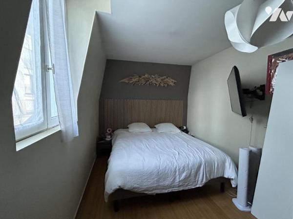 A VENDRE - MAISON DE VILLE AVEC GARAGE - CENTRE VILLE - LAVAL 