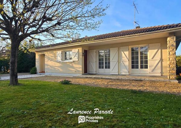Maison avec double garage et parc