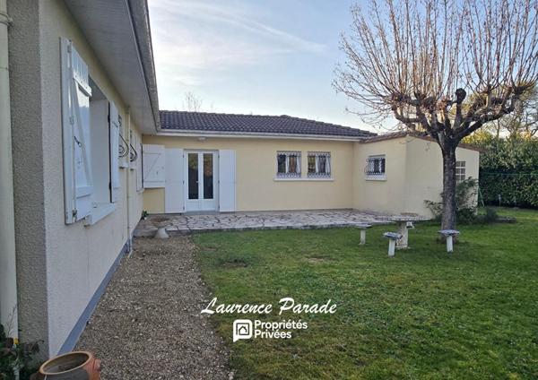 Maison avec double garage et parc