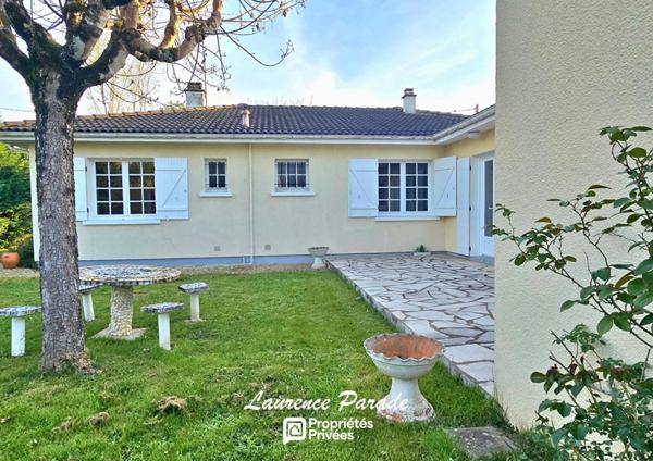 Maison avec double garage et parc
