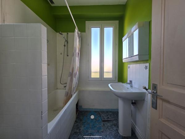 Appartement en triplex 4 pièces avec balcon et stationnement