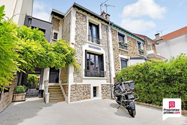 Maison d'architecte et jardin arboré à 8 minutes du RER