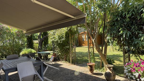 Centre ville belle maison "année 30" avec jardin et garage .