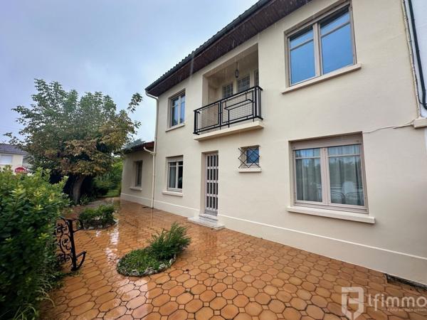 Maison avec garage et jardin au calme