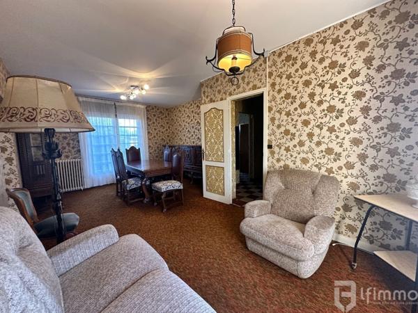 Maison avec garage et jardin au calme