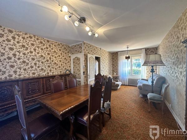 Maison avec garage et jardin au calme