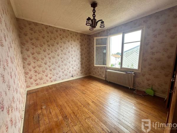 Maison avec garage et jardin au calme