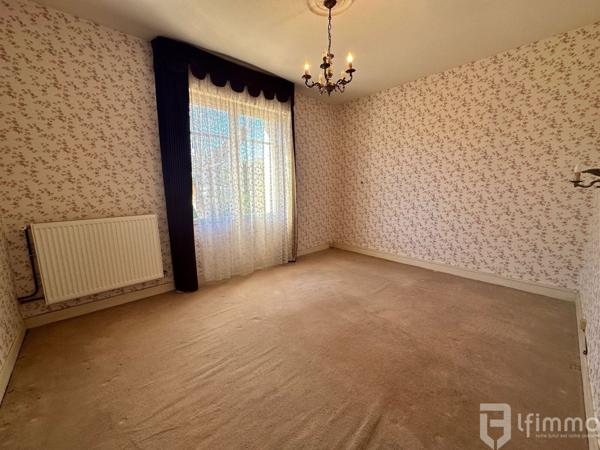 Maison avec garage et jardin au calme