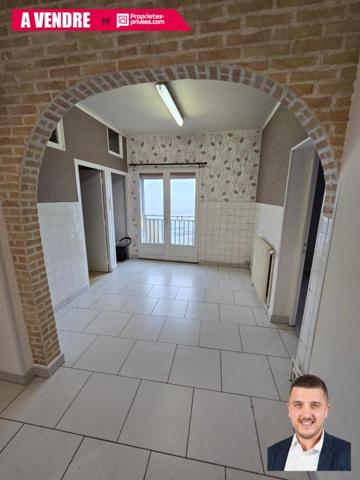 Maison de ville avec potentiel ? Rue calme, proche établissements scolaires