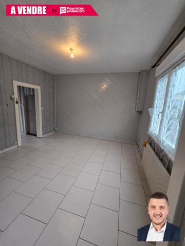 Maison de ville avec potentiel ? Rue calme, proche établissements scolaires