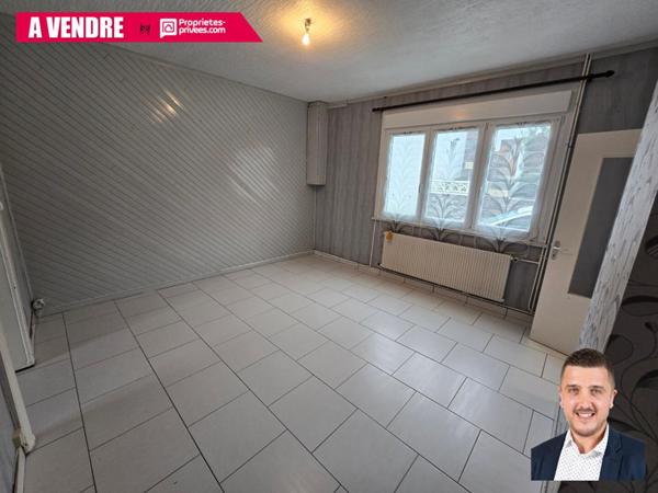 Maison de ville avec potentiel ? Rue calme, proche établissements scolaires