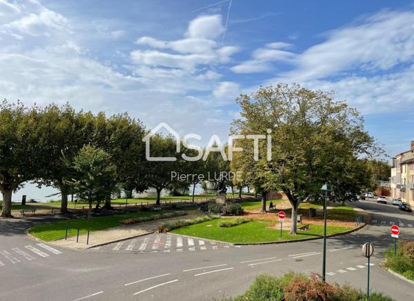 Maison de ville à rénover avec garage et terrasse