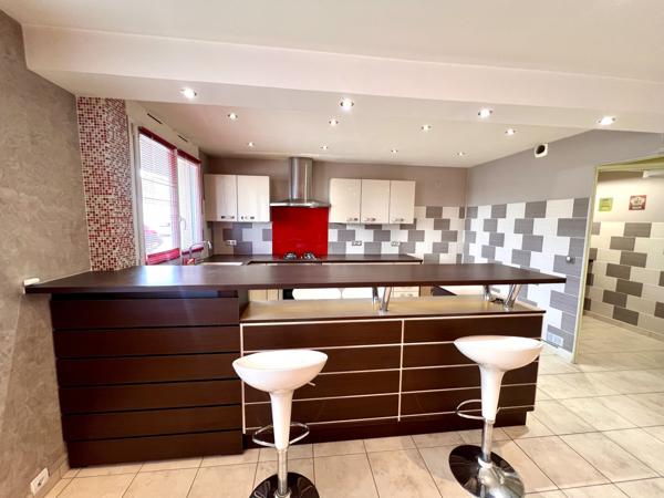 6 Pièces de 104m2 + parking privé