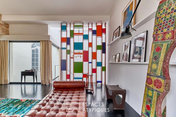 Iconique duplex esprit maison-loft à SoPi