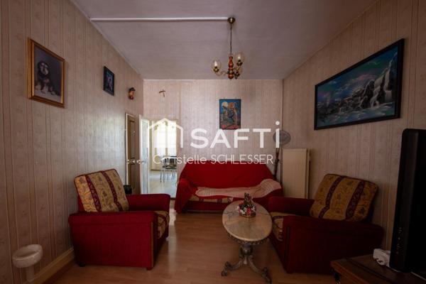 Maison de ville 126 m2 habitables pouvant être divisée en appartements avec un garage, une cave et un grenier aménageable