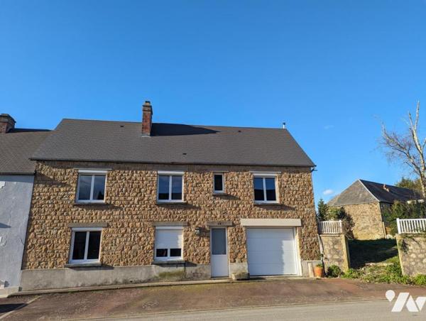 Maison avec beaux volumes à BOURGVALLEES (SOULLES Eglise)