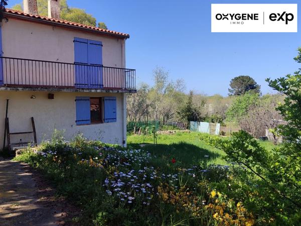 Maison au coeur du village avec un grand terrain encore constructible