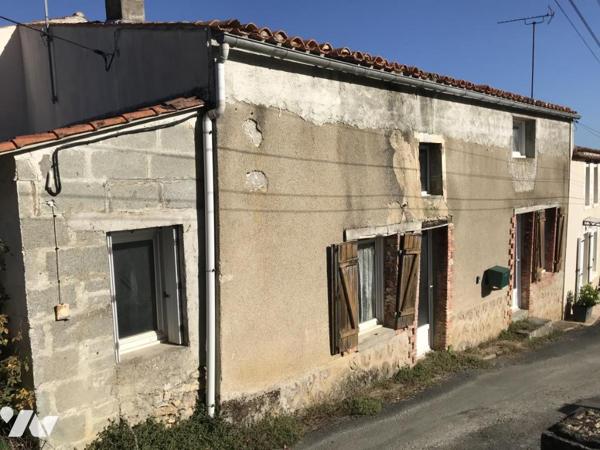 Ancienne maison d'habitation à rénover.