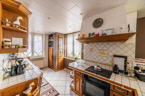 Maison mitoyenne, avec de jolies prestations.