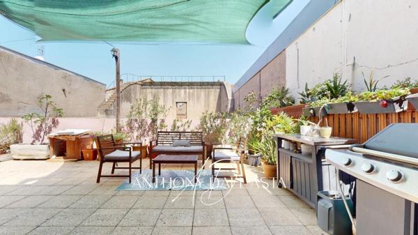 Ensemble immobilier avec appartement de 105 m² avec une grande terrasse, une chambre de bonne et une cave