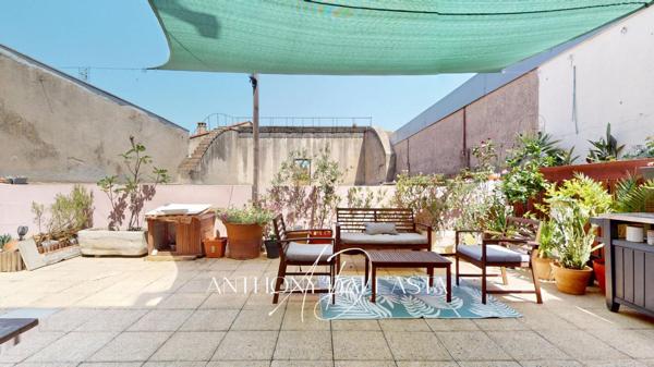 Ensemble immobilier avec appartement de 105 m² avec une grande terrasse, une chambre de bonne et une cave