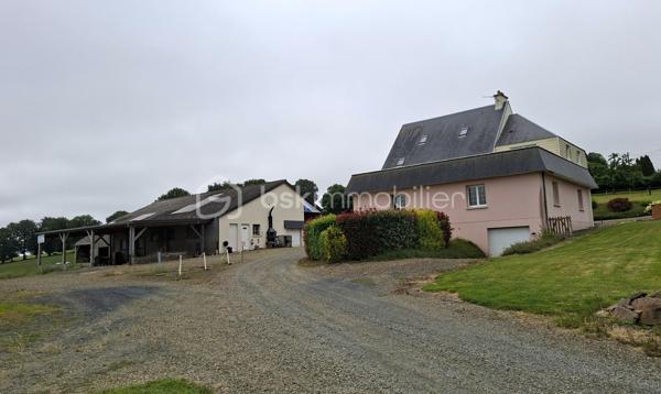 Rare sur le marché, cette propriété offre un ensemble immobilier complet alliant confort de vie, activité professionnelle et importantes capacités de stockage.
La maison principale développe environ 200 m² habitables et séduit par ses volumes généreux. Dès l'entrée, vous découvrirez un vaste hall agrémenté d'un espace bar. La pièce de vie de près de 60 m² comprend une cuisine aménagée et équipée ouverte sur la salle à manger et le salon. Une buanderie complète ce niveau.
L'espace nuit propose 5 belles chambres, dont une au rez-de-chaussée. À l'étage, une superbe chambre de 27 m² équipée d'un espace balnéo bénéficie d'un accès direct à une terrasse panoramique de 50 m² offrant une vue imprenable sur les environs.
Une salle de bains complète ainsi que des WC à chaque niveau.
Le sous-sol comprend un grand garage, une chaufferie et une seconde buanderie.

Un pôle professionnel aux multiples possibilités
Une vaste dépendance à usage professionnel 
Au rez-de-chaussée :
Garages, ateliers, espaces de stockage, pièce de vie, cave à vins.
À l'étage :
Bureaux, salle de réunion, local archives, sanitaires et WC.
Dans son prolongement, un important espace d'entreposage permet de répondre à de nombreux besoins professionnels ou logistiques.
Attenant à la dépendance, un appentis couvert d'environ 260 m²  

Les atouts de la propriété
- Maison principale de 200 m² habitables
- Grande pièce de vie de 60 m²
- 5 chambres dont une de plain-pied
- Suite de 27 m² avec espace balnéo
- Terrasse panoramique de 50 m²
- Sous-sol complet avec garage

Fort potentiel professionnel, artisanal ou de stockage
Ensemble immobilier rare offrant de multiples possibilités d'exploitation