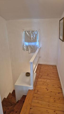 Ensemble immobilier constitué de deux maisons et son garage et extérieur à Saint Jean D'Angely