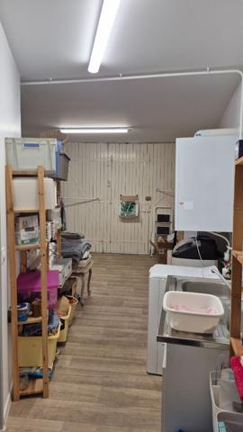 Ensemble immobilier constitué de deux maisons et son garage et extérieur à Saint Jean D'Angely