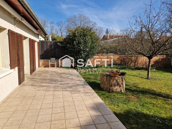 Maison 4 chambres, beau jardin, garage, sous-sol