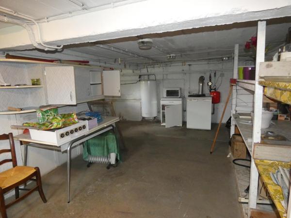 Charmante maison de maître T5 de 135m² avec grand garage de 60m², cave de 35m² et jardin de 225m².