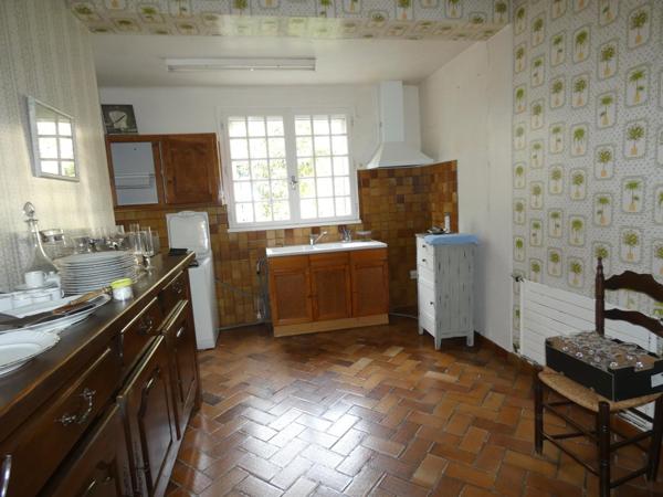 Charmante maison de maître T5 de 135m² avec grand garage de 60m², cave de 35m² et jardin de 225m².