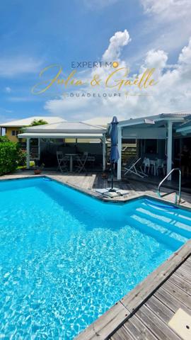 À VENDRE – LE MOULE | Maison moderne avec piscine et carbet – 495 000 € 495 000 €