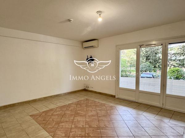 Appartement T3 avec terrasse, cave et place de parking